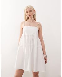 Collusion - Robe babydoll courte à fines bretelles - blanc - Lyst
