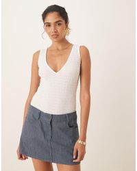 agon® - V Neck Ribbed Bodysuit - Lyst