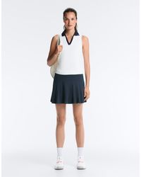 Oysho - Short Pleated Piqué Skirt - Lyst