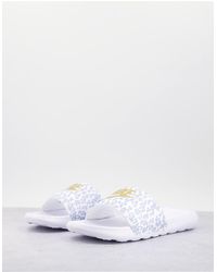 leopard print nike slides