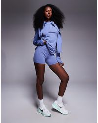 Nike - Leggings Cortos De 4" Azules De Talle Alto Swift Dri-Fit De - Lyst