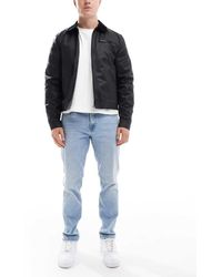 JJ Rebel - Adam Tapered Jeans - Lyst