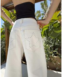 Bershka - Broek Met Wijde Ronde Pijpen En Studs - Lyst
