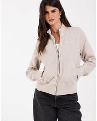 Levi's - Pull col cheminée zippé coupe slim écru - Lyst
