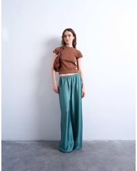 TOPSHOP - Broek Van Satijn Met Lage Taille, Rechte Pijpen En Textuur - Lyst