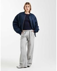 ASOS - Joggingbroek Van Brushback Stof Met Wijde Pijpen - Lyst