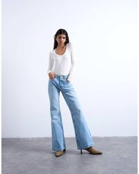 TOPSHOP - Pippa Mid Rise Comfort Stretch Flare Jean - Lyst