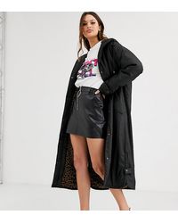 ASOS Giacca antipioggia lunga nera con fodera in pile borg animalier - Nero