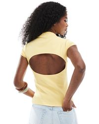 ASOS - T-shirt raccourci dos nu en maille côtelée compacte avec col montant - beurre - Lyst