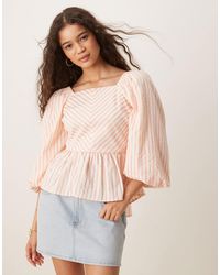 Y.A.S - Tie Back Puff Sleeve Peplum Hem Top - Lyst
