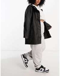 Vero Moda - Rubberised Hooded Raincoat - Lyst