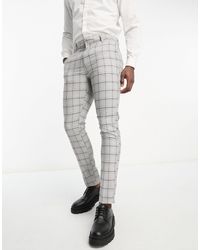 New Look - Pantaloni skinny grigi a quadri - Lyst