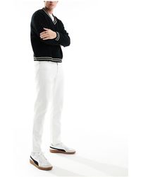 Tommy Hilfiger - Jeans dad fit affusolati regular fit lavaggio bianco - Lyst