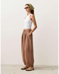 Oysho - 100% Linen Striped Balloon Trousers - Lyst