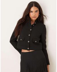 Mango - Chaqueta De Sastre Corta Negra Con Botones Dorados De Algodón De - Lyst