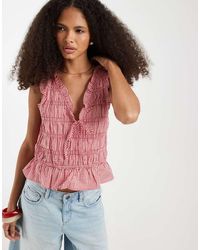 Gap - Sleeveless Tie Front Blouse With Ruffle Detail - Lyst