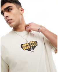 ASOS - T-shirt oversize beige con stampa di pugni sul petto - Lyst