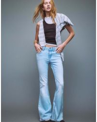 Stradivarius - D04 Low Rise Flared Jeans - Lyst