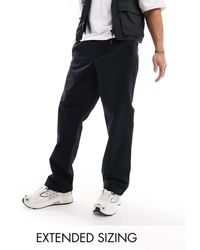 ASOS - Pantalones s holgados sin cierres con cintura elástica - Lyst