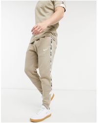 nike logo taping sweatpants in green