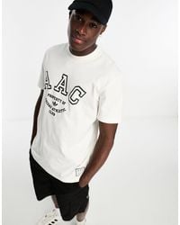adidas Originals - Rifta aac - t-shirt bianca con logo stile college grande - Lyst