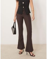 Gina Tricot - Low Rise Flare Leg Stretch Trousers - Lyst