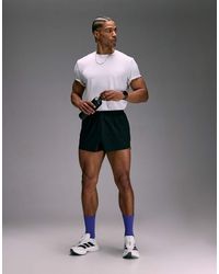 4505 - 2"" Ultra Short Running Shorts With Elastic Waist Band And Zip Pockets - Lyst