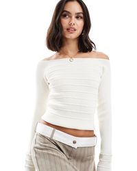 ASOS - Top en maille à encolure bardot et épaules dénudées avec coutures apparentes - crème - Lyst