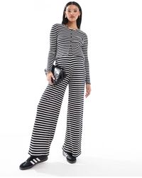 Mama.licious - Mamalicious maternity - pantalon large d'ensemble en jersey à rayures - noir et blanc - Lyst