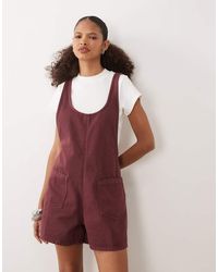 ASOS - Denim Playsuit With Scoop Neck And Cross Back - Lyst