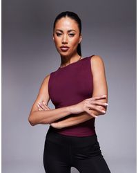 4505 - Icon High Neck Tank With Inner Bra - Lyst