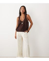 ASOS - Asos Design Petite Wide Leg Trousers With Pleat Detail - Lyst