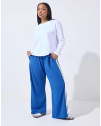 Yours Clothing - Side Stripe Wide Leg Trousers - Lyst