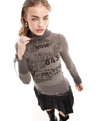 Minga - London Distressed Roll Neck Jumper With Retro Graphics - Lyst