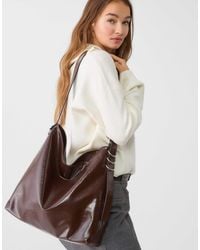 Stradivarius - – beuteltasche aus kunstleder - Lyst