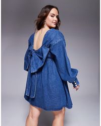 ASOS - Curve - robe babydoll courte en jean à manches longues et nœud dans le dos - Lyst