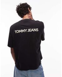 Tommy Hilfiger - T-Shirt Oversize Nera Con Stampa Del Logo Sul Retro - Lyst