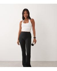 4505 - Leggings Negros Para Yoga De Corte Slim Acampanado Y Talle Alto De Tejido Suave Icon De Petite - Lyst