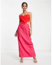 Never Fully Dressed - Vestido largo rosa y rojo con abertura y diseño en forma - Lyst