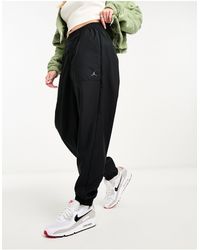 Nike - Core Woven Track joggers - Lyst