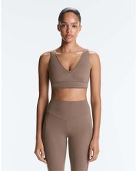 Oysho - Medium-support Comfortlux Sports Bra With Hemstitch - Lyst