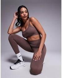 4505 - Fuller Bust Sculpting Seamless Medium Support Sports Bra - Lyst