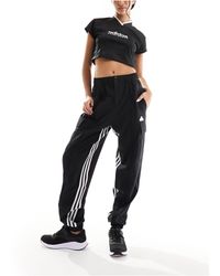 adidas Originals - Adidas - training dance - pantaloni cargo neri - Lyst