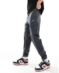 Nike - Club - pantalon cargo tissé - foncé - Lyst