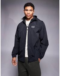 EA7 - Chaqueta Negra Ligera Con Capucha Y Logo De Armani - Lyst