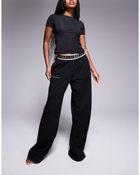 EA7 - Pantalones Negros De Pernera Ancha Con Logo En La Cinturilla De Armani - Lyst