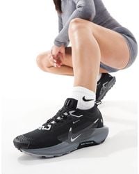 Nike - Reactx pegasus trail 5 - baskets en gore-tex - triple - Lyst