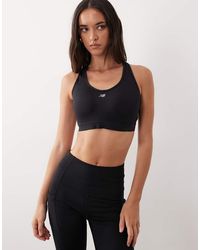 New Balance - Essential Run Sports Bra - Lyst