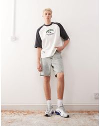 Aape By A Bathing Ape - Aape by a bathing ape - short en jean à logo - délavage clair - Lyst
