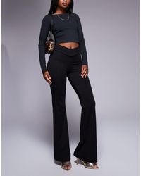 ASOS - Pantalon évasé près du corps à doublure et taille en v - Lyst